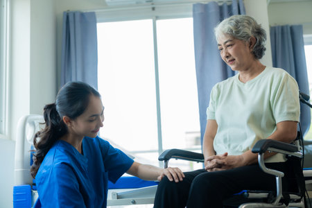 Asian women were cared for by nurses who tracked their health and musculoskeletal rehab. on the legs, knee joints and for elderly womenの写真素材