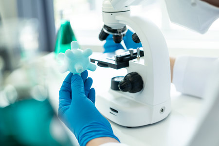 Drug research in chemistry lab, chemical scientist working with microscope, analyzing liquid testing...