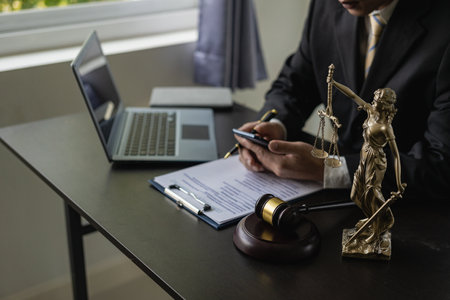 The weighing scale of justice Lawyer behind the scenes, law, justice, jurisdiction concept, judge, hammer, lawyer working on documents Laws, advice and ideasの写真素材