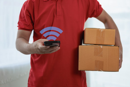 Delivery man and parcel box at the door for customer ordering parcels or goods in courier delivery...