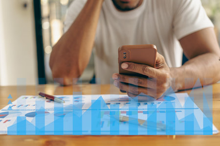 Businessman analyzing company financial report, balance sheet, working with document graphs Save photos for the stock market, office, taxes, close-up photos.の写真素材