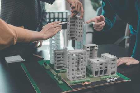 Experienced real estate agents show home plans to clients. and be ready to sign and explain business...