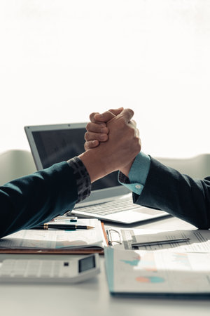 business people shaking hands End of meeting, business etiquette, merger concept Completing the...