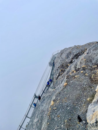 Stairway to heaven, A view of the cliffside walk surrounded by mist in the morning.