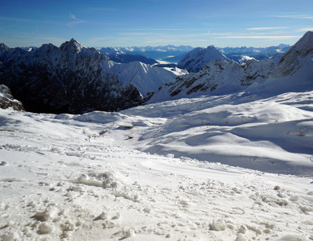 Beautiful nature view of Zugspitze peak in winter with snow capped mountains. Germany.の写真素材