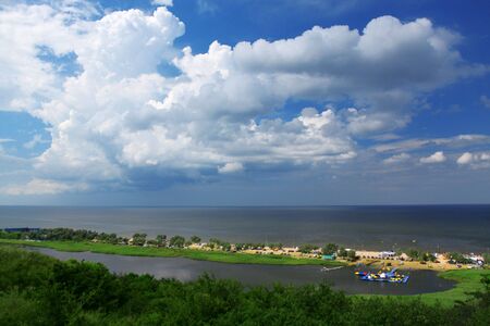 Beautiful landscape with sea and cloudy skyの写真素材