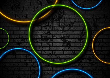 Colorful neon circles on grunge brick wall background. Vector retro designのイラスト素材