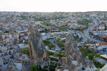 Landscape of Goreme villae of Cappadocia with fairy chimneys and stone housesの写真素材