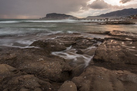 Sunset in Alanya - coastal town in Mediterranean Turkey. Long Exposure shot. Horizontal composition.の写真素材