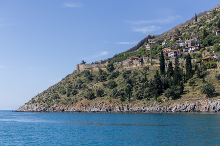 Summer travel concept. Landscape with castle rock of Alanya - a coastal town of Turkish Rivieraの写真素材