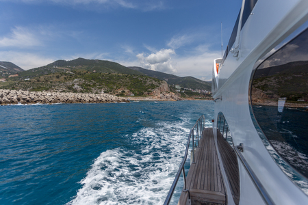 Summer travel concept. Sailing at white boat in  Mediterranean sea.の写真素材