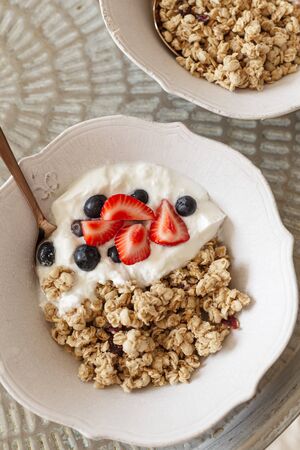 Healthy breakfast concept. Topview image of granola with berriesの写真素材