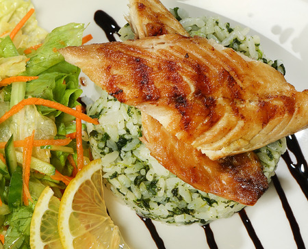 Fish Mackerel with rice, spinach and vegetables.