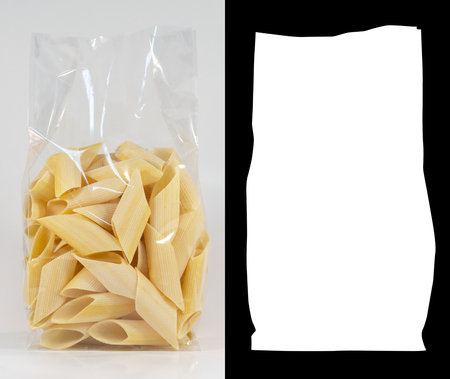 Transparent plastic pasta bag "penne rigate" on white background. With alpha channelの写真素材