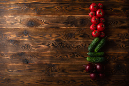 Vegetables on a brown wooden backgroundの写真素材