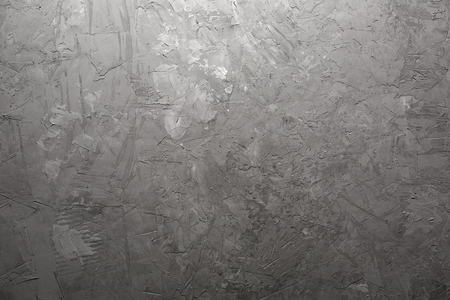 gray abstract cement background with inequalitiesの写真素材