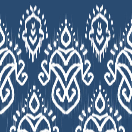 Ikat geometric folklore ornament. Oriental vector damask pattern. Ancient art of Arabesque. Tribal ethnic texture. Spanish motif on the carpet. Aztec style. Indian rug. Gypsy, Mexican embroidery.の写真素材