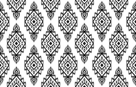 Ikat geometric folklore ornament. Tribal ethnic vector texture. Seamless striped pattern in Aztec style. Figure tribal embroidery. Indian, Scandinavian, Gypsy, Mexican, folk pattern.の写真素材