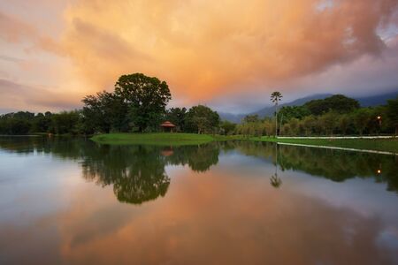 Orange reflection by the lakeの写真素材