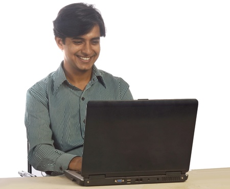 Man working in office on laptopの写真素材