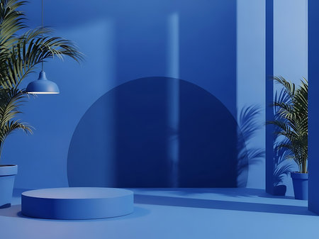 This photograph features a monochromatic blue studio scene with a minimalist design It showcases geometric shapes including a circular backdrop and a cylindrical platform Tropical plants in matching blue pots add a touch of nature The scene is ideal for product displays artistic presentations or creating a serene and visually appealing environmentの素材