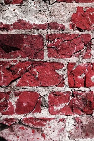 Cracked and dangerous blue brickwallの写真素材