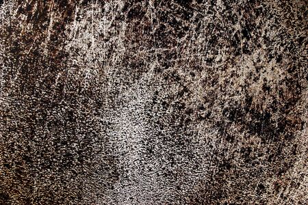 Scratched metal grunge surface with corrosionの写真素材