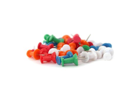 Multicolor drawing pins isolated on whiteの写真素材