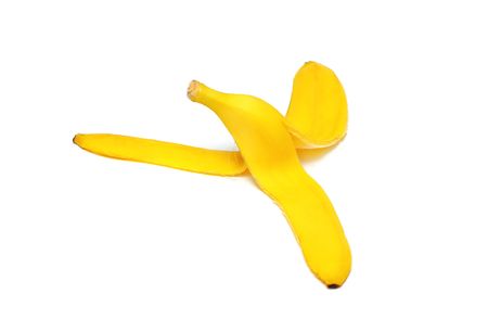 banana peel isolated on whiteの写真素材