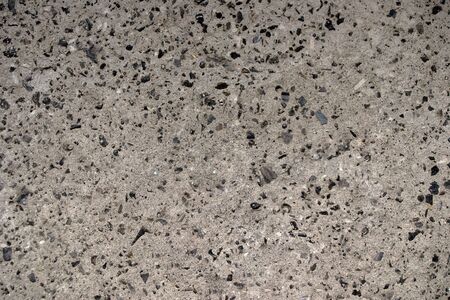 Grunge wall decorated by stone