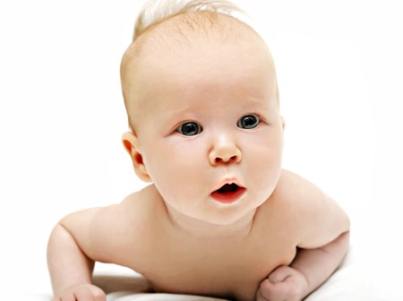 bright picture of crawling newborn baby の写真素材