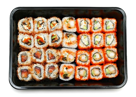 Sushi set in the plastic box isolated の写真素材
