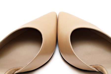 Brown woman shoes isolated on white backgroundの写真素材