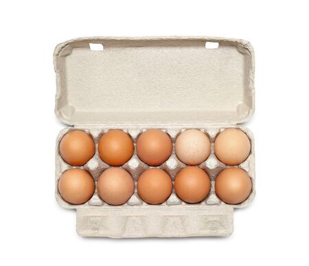 Eggs in the box isolated on whiteの写真素材