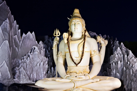 BANGALORE, INDIA - MARCH 27: Big Lord Shiva statue sitting in lotus with trident on March 27, 2012 in Bangalore, India. This Shiva Statue is highest in the world - 65 feet high.のeditorial素材