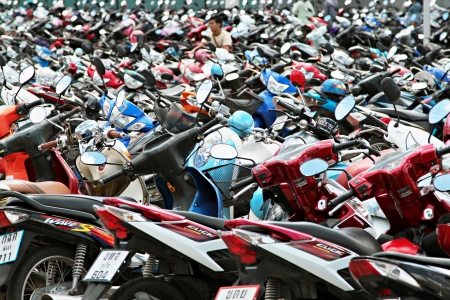 PHUKET, THAILAND - NOVEMBER 20: Many motorbikikes at the parking near big store on November, 20, 2010, Phuket, Thailand. Motorbike is a most popular transport in Thailand.のeditorial素材