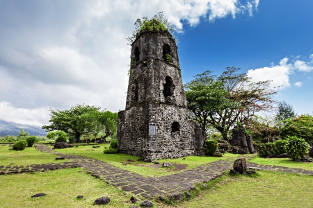 Cagsawa Ruins are the remnants of an 18th century Franciscan church, built in 1724 and destroyed by the 1814 eruption of the Mayon Volcano.の写真素材