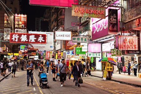 HONG KONG - MARCH 19: Neon lights on Mongkok street on March, 19, 2013. Mongkok street is a very popular shopping place in Hong Kong.