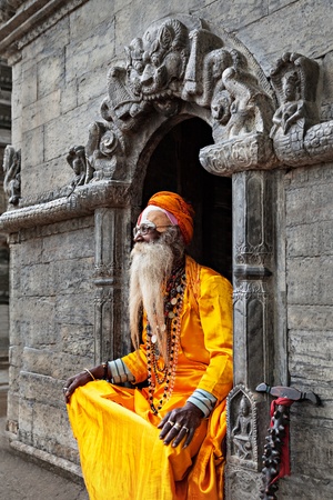 KATHMANDU - APRIL 15: Sadhu at Pashupatinath Temple in Kathmandu, Nepal on April 15, 2012. Sadhus are holy men who have chosen to live an ascetic life and focus on the spiritual practice of Hinduismのeditorial素材