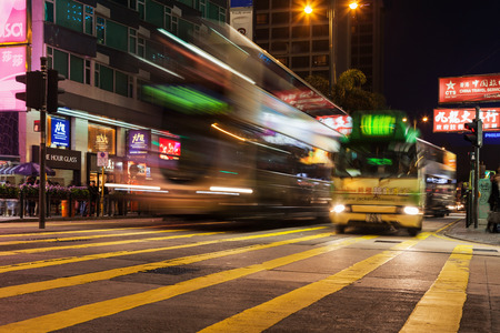 HONG KONG - FEBRUARY 21: Public transport on the street on February 21, 2013 in Hong Kong. Over 90% daily travelers use public transport. Its the highest rank in the world.のeditorial素材
