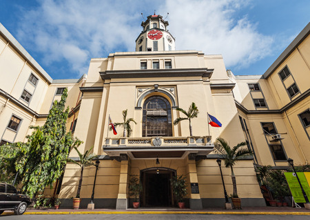 MANILA, PHILIPPINES - MARCH 18: The clock tower of the Manila City Hall on March, 18, 2013, Manila, Philippines. The Manila City Hall is one of the distinct landmarks in Manila, in the Philippines.のeditorial素材
