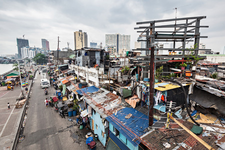 MANILA, PHILIPPINES - MARCH 18: Slum region on March, 18, 2013, Manila, Philippines. Manila is a Philippines capital with very strong contrasts in standard of living.のeditorial素材
