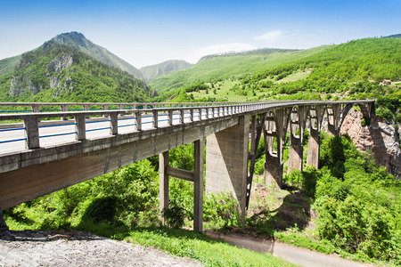 Tara Bridge is a concrete arch bridge over the Tara River in Montenegroの写真素材