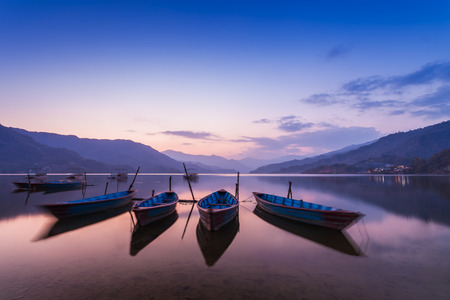 Colorful boats at Begnas lake, Pokhara region, Nepalの写真素材