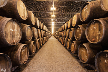 PORTO, PORTUGAL - JULY 01: Barrels with Porto Wine in the wine cellar on July 01, 2014 in Porto,...