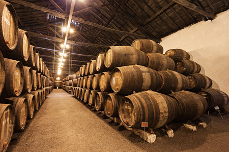 PORTO, PORTUGAL - JULY 01: Barrels with Porto Wine in the wine cellar on July 01, 2014 in Porto, Portugalのeditorial素材