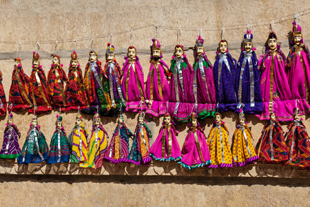 JAISALMER, INDIA - OCTOBER 14: Colorful handmade puppets on display for sale on October 14, 2013, Jaisalmer, India.のeditorial素材