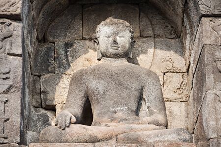 Buddha statue in Borobudur Temple, Java island, Indonesia.の写真素材