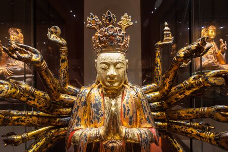 SINGAPORE - OCTOBER 15, 2014: Buddha statue in Asian Civilisations Museum.のeditorial素材