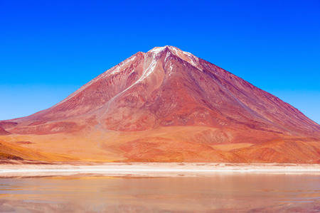 Licancabur volcano and Laguna Verde (Green Lake) in Altiplano, Boliviaの写真素材
